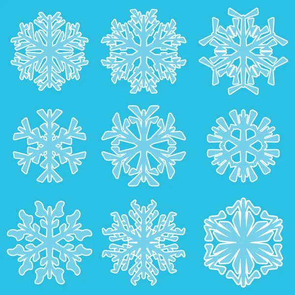 Geometriska blå snöflingor — Stock vektor