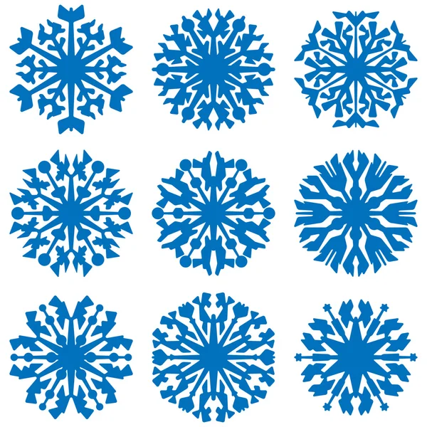 Geometrische blauwe sneeuwvlokken set — Stockvector