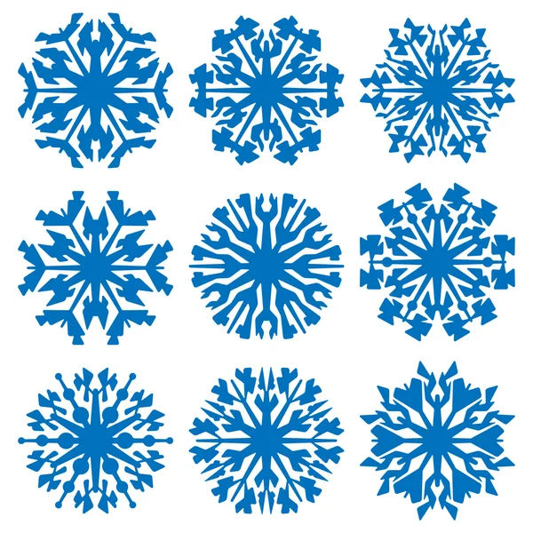 Ensemble de flocons de neige bleu géométrique — Image vectorielle