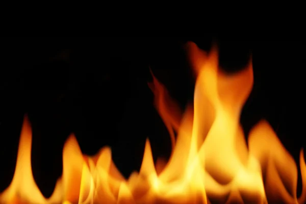 Flammen als Hintergrund — Stockfoto