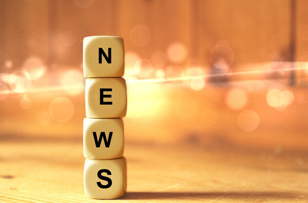 dice with the word news