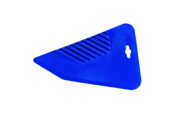 Spatule Plastique Bleu Pour Papier Peint Gros Plan Isolé Sur Image En Vente