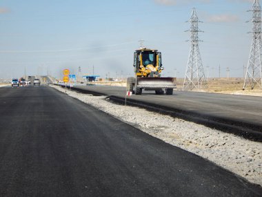 Construction of a new asphalt road. Kazakhstan. 16 September 2019 year. Mangistau region.
