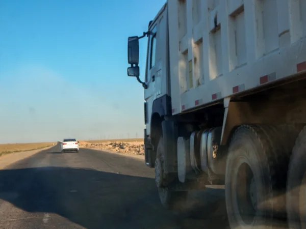 Overtaking truck on the narrow road — Stock Photo, Image