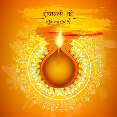 Beautiful lit lamp for Happy Diwali celebration.