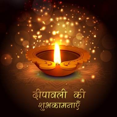 Traditional illuminated lit lamp for Happy Diwali.
