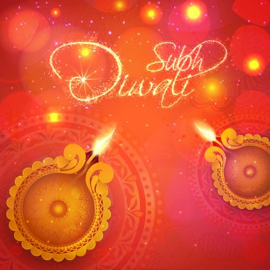 Greeting card with lit lamps for Happy Diwali.