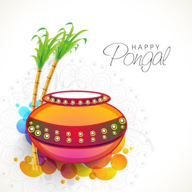 Mud pot with sugarcanes for Pongal celebration.