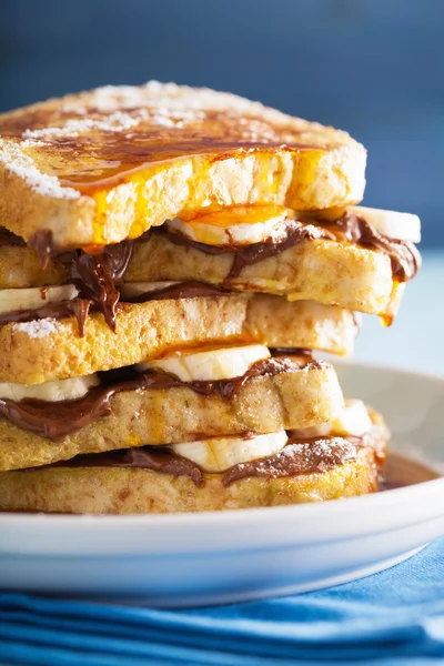 French toasts with banana chocolate sauce and caramel for breakf — Stock Photo, Image