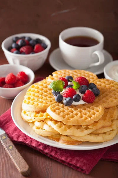 Waffles with creme fraiche and berries for breakfast — Stock Photo, Image