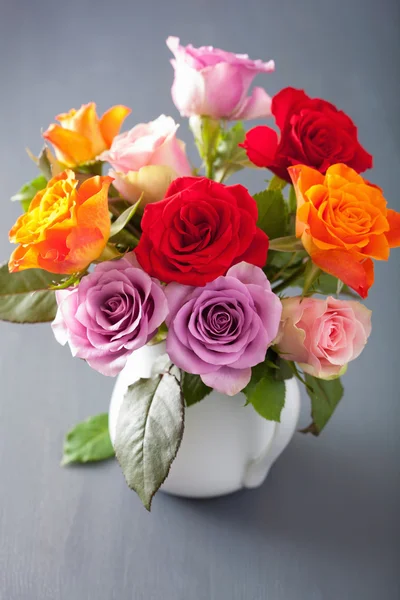 Beautiful colorful rose flowers bouquet in vase — Stock Photo, Image