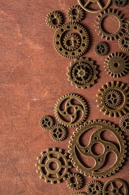 Steampunk Mekanik vites tekerlek ahşap arka plan üzerinde Dişliler