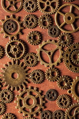 Steampunk Mekanik vites tekerlek ahşap arka plan üzerinde Dişliler