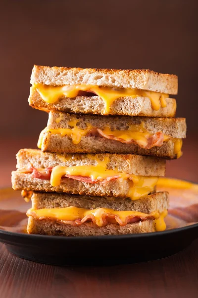 Grilled cheese and bacon sandwich — Stock Photo, Image