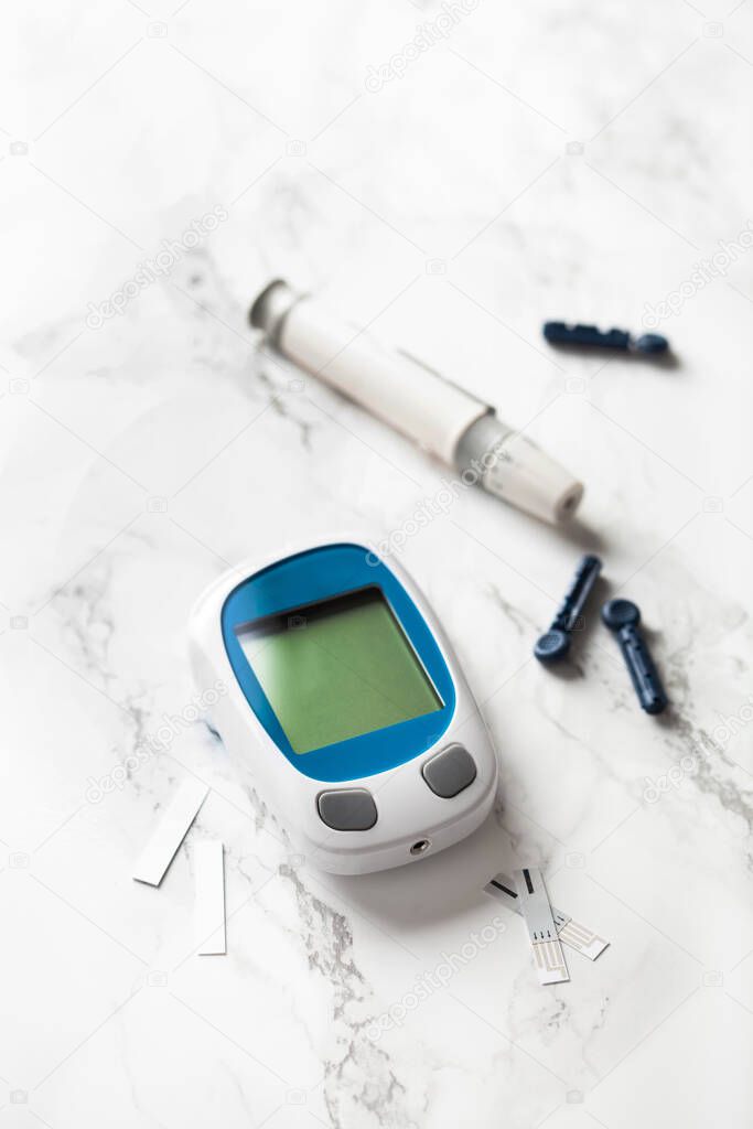 glucometer ketometer lancet and strips for self-monitoring of blood glucose or ketones level. diabetes or keto diet