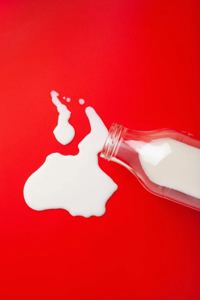 bad milk lactose intolerance allergy. milk bottle splatter. avoid dangerous dairy