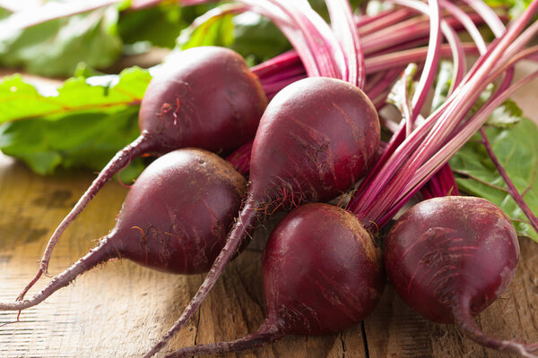 fresh beetroot on wooden background