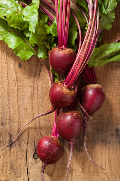 fresh beetroot on wooden background 