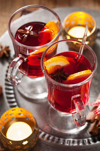 Glass of mulled wine with orange and spices, christmas decoratio — Stock Photo, Image