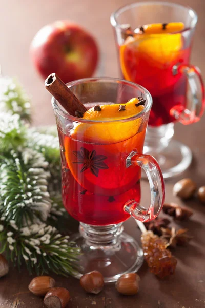 Glass of mulled wine with orange and spices, christmas decoratio — Stock Photo, Image