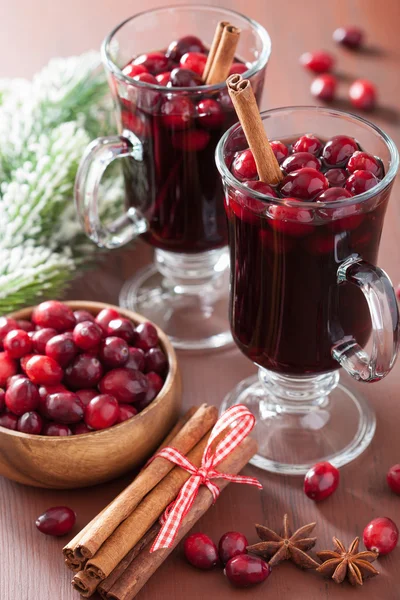 Glass of mulled wine with cranberry and spices, winter drink — Stock Photo, Image