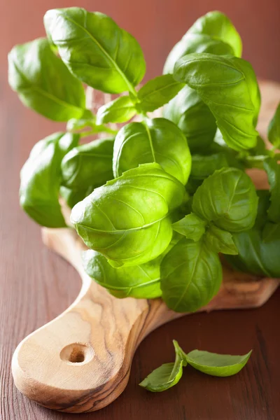 Fresh basil leaves herb on wooden background — Stock Photo, Image