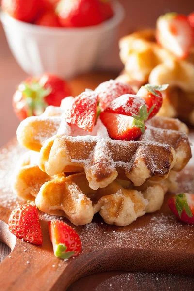 Belgian waffles with icing sugar and strawberry — Stock Photo, Image