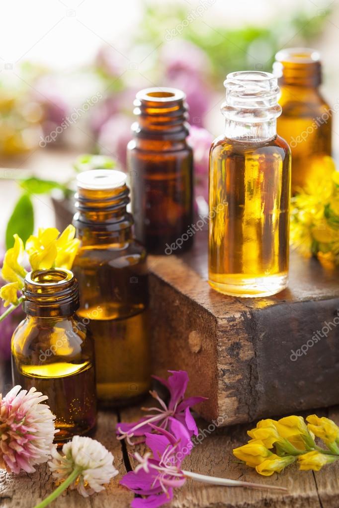Essential oils and medical flowers herbs — Stock Photo © duskbabe #71826623