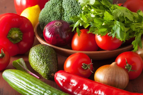 Healthy vegetables tomato avocado onion broccoli cucumber celery — Stock Photo, Image