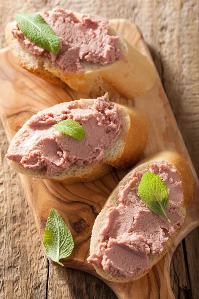 Healthy chicken liver pate with sage on bread — Stock Photo, Image