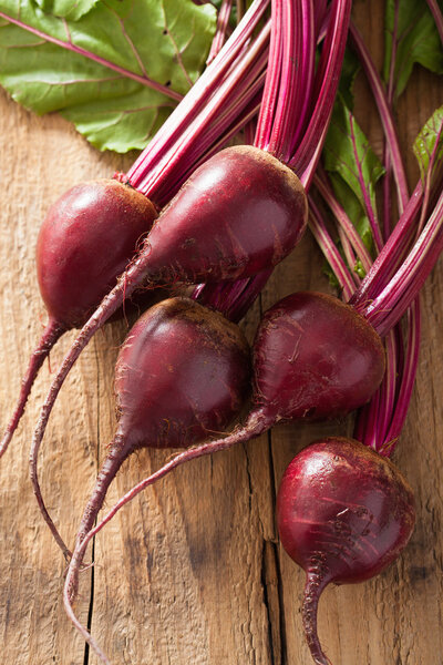 fresh beetroot on wooden background 