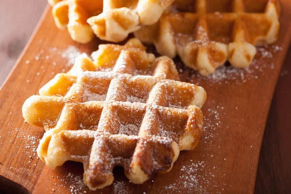 Belgian waffles with icing sugar — Stock Photo, Image