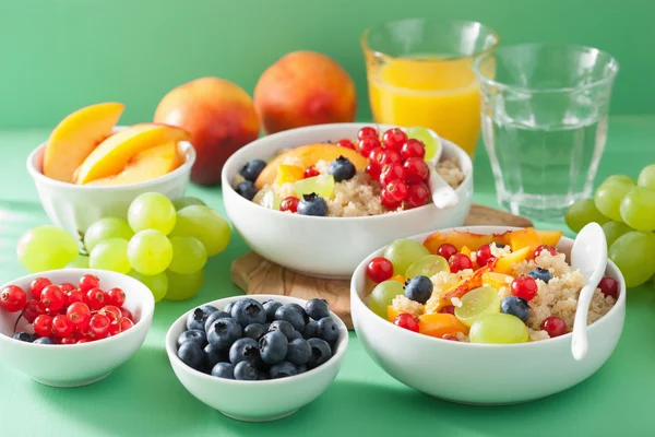 Healthy breakfast quinoa with fruits berry nectarine blueberry g — Stock Photo, Image