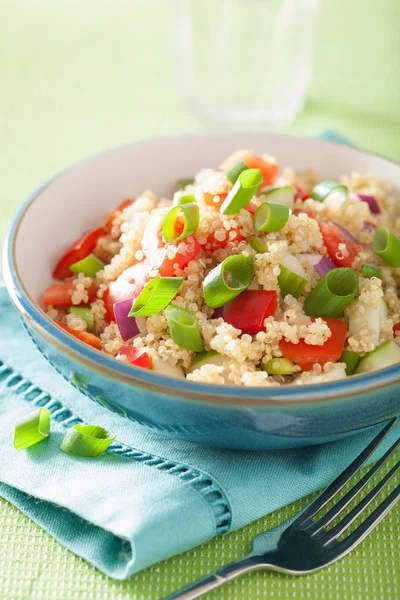 healthy quinoa salad with tomato cucumber onion chives