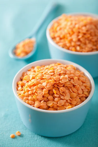Raw healthy red lentils in bowl — Stock Photo, Image