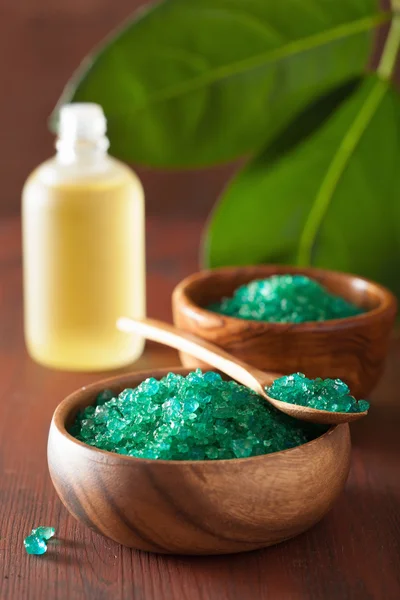 Green herbal salt and essential oils for healthy spa bath — Stock Photo, Image