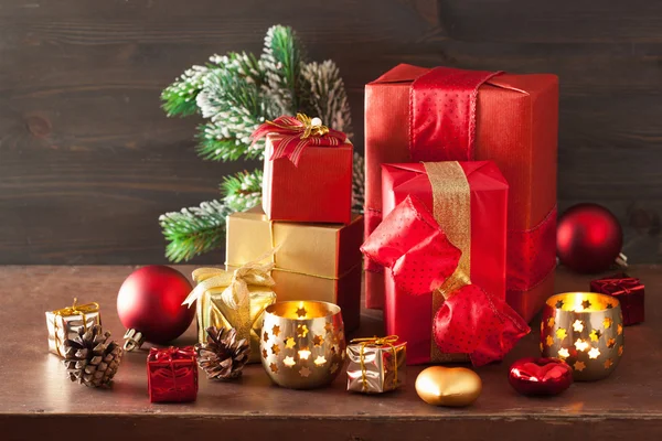 Red and golden christmas gift box and decoration — Stock Photo, Image