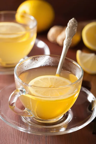 Hot lemon ginger tea in glass cup — Stock Photo, Image