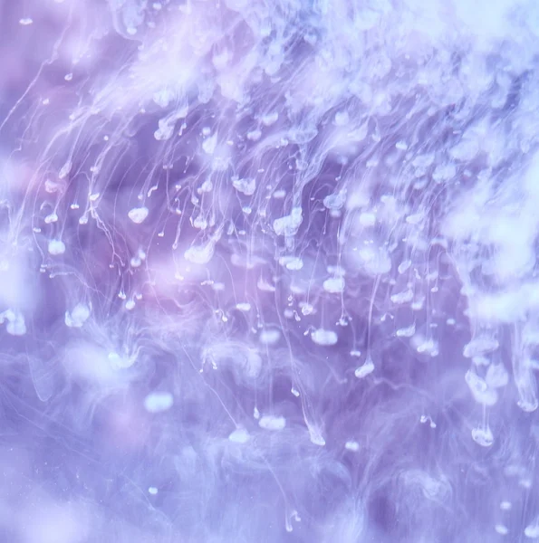 Cloudy purple and white ink in water — Stock Photo, Image