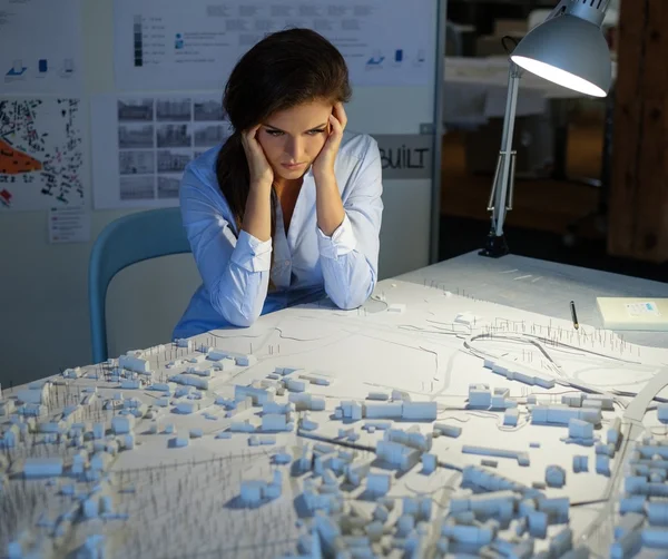 Tired young architect having a problem — Stock Photo, Image