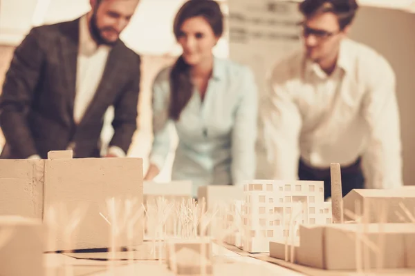 Confident team of engineers working together — Stock Photo, Image