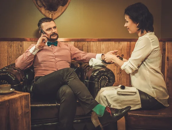 Old-fashioned man doing male manicure — Stock Photo, Image