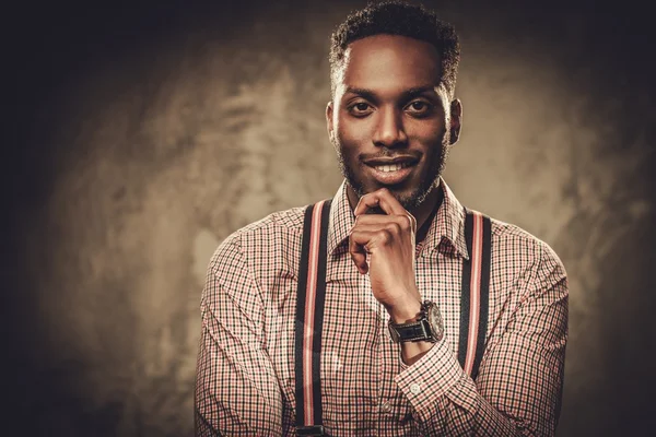 Stylish young black man with suspenders — Stock Photo, Image