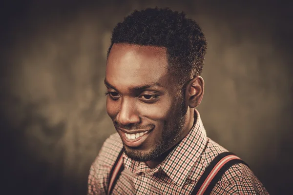 Stylish young black man with suspenders — Stock Photo, Image