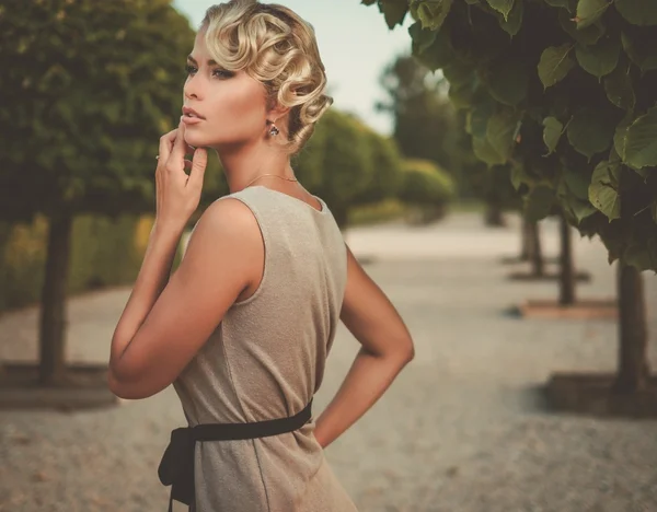 Lady in a beautiful alley — Stock Photo, Image