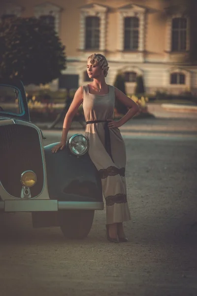 Lady near classic convertible Royalty Free Stock Images