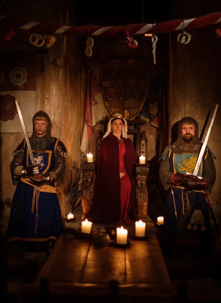 Medieval queen with her knights — Stock Photo, Image