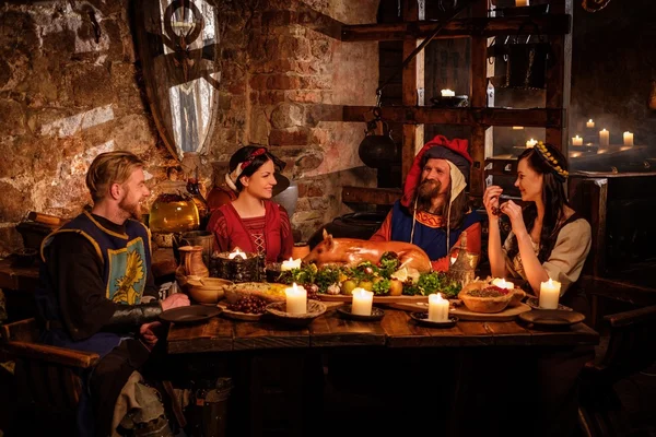 Medieval people eat and drink — Stock Photo, Image