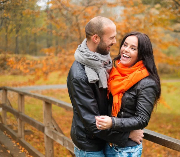 Happy middle-aged couple outdoors on beautiful autumn day — Stock Photo, Image