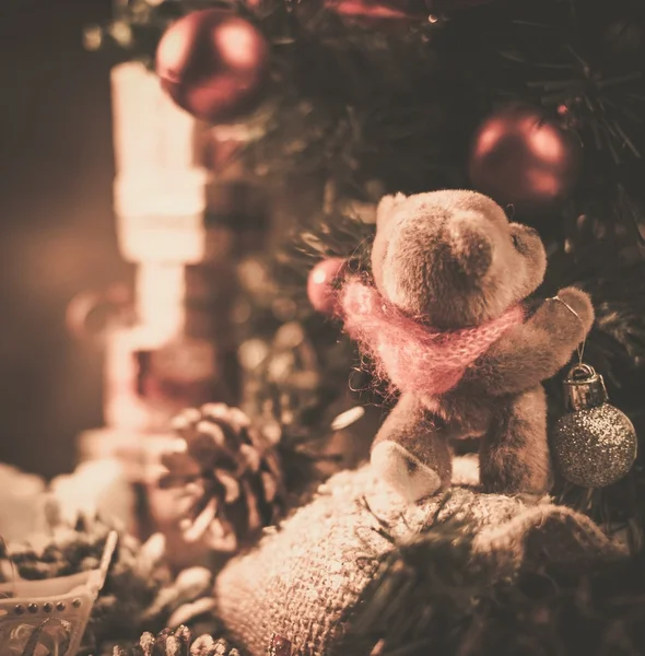 Christmas still life with teddy bear decorating tree — Stock Photo, Image